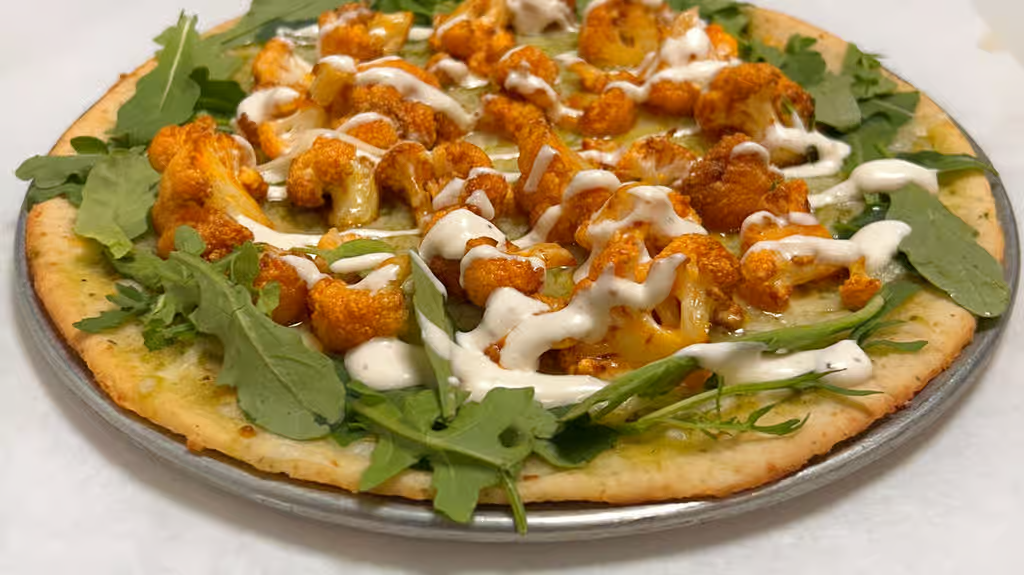 Buffalo Cauliflower Pizza (Fried buffalo cauliflower pesto vegan cheese vegan ranch)
