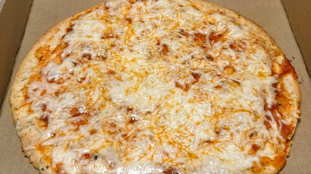 Cauliflower Crust "Cheese" Pizza (marinara sauce vegan cheese)